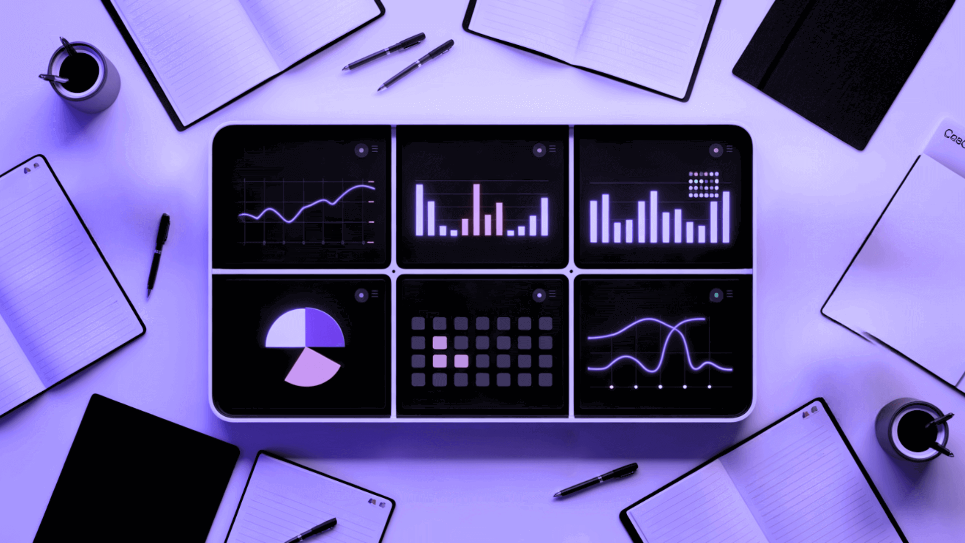 A monitor showing a media dashboard with bar charts, a donut chart, and a line graph amid floating document cards on a purple background.