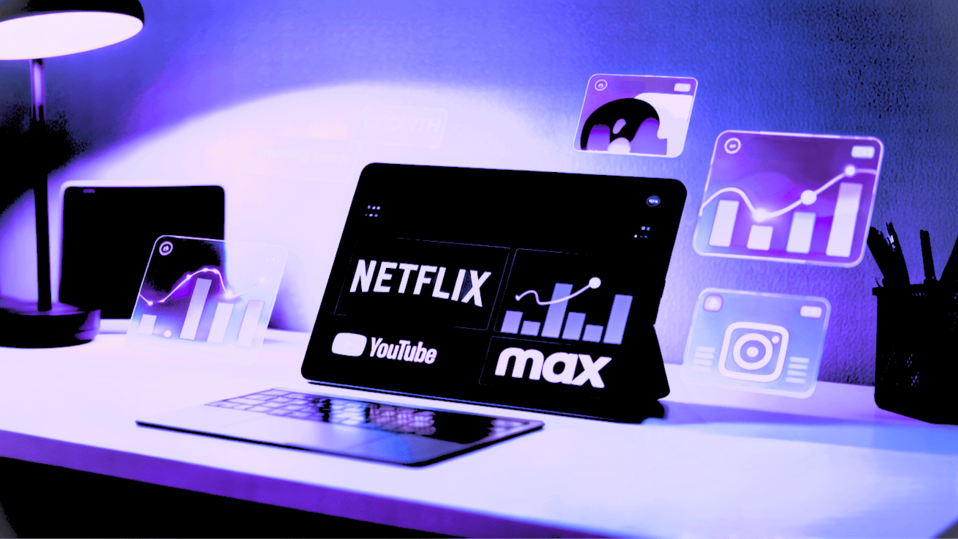 A monitor showing streaming app icons including ones resembling Netflix, YouTube, Max, and Instagram, with a small bar chart, lit in purple.